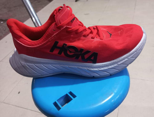 HOKA red running shoe, size 41, photographed for Lbass Original Morocco