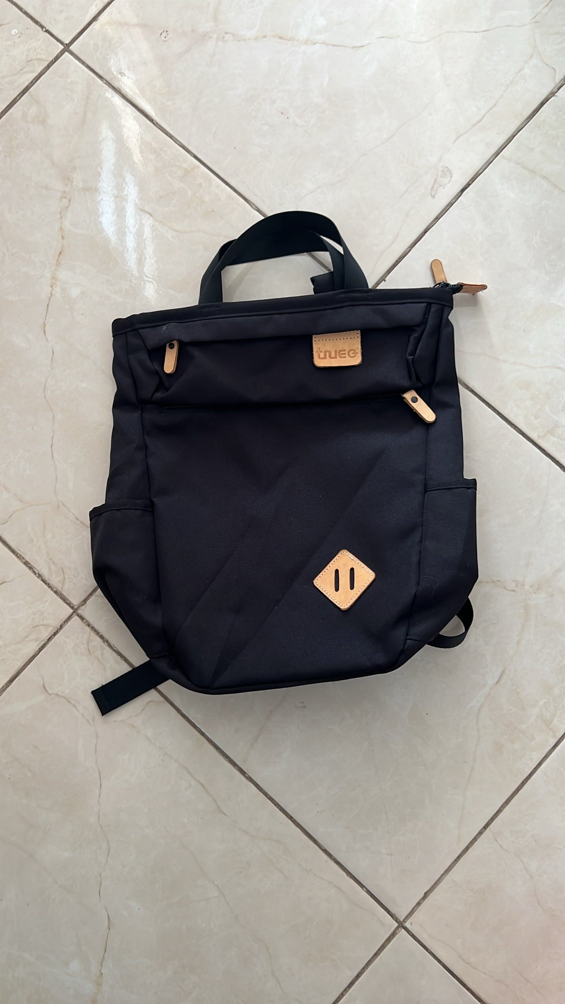 TheTrueC black city backpack second-hand, real photo, Lbass Original Morocco — front view